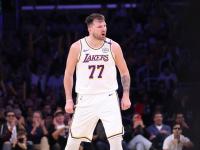 PG游戏- 刷新纪录引发热议！，东契奇在MAD比赛中刷新纪录上演精彩一战